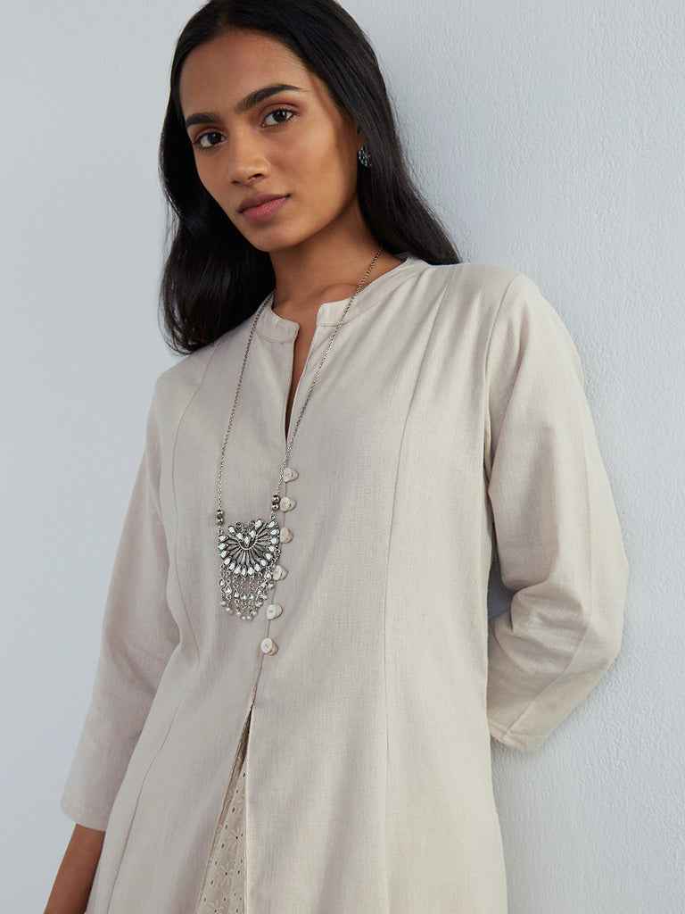 Utsa Beige Schiffli-Detailed A-Line Kurta for women close up view - Westside