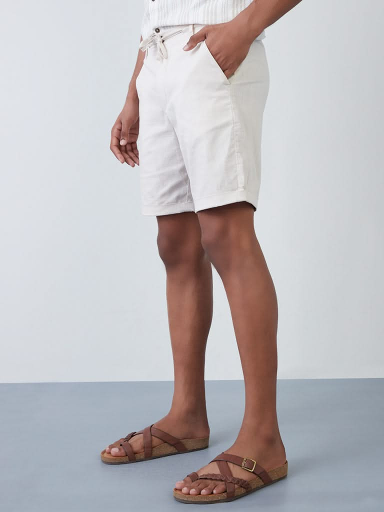 ETA Ecru Self-Patterned Slim-Fit Shorts | ETA Ecru Self-Patterned Slim-Fit Shorts for Men Front View - Westside