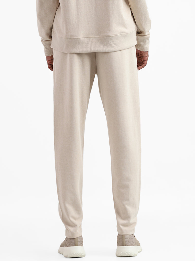 Studiofit Solid Beige Relaxed-Fit Mid-Rise Joggers