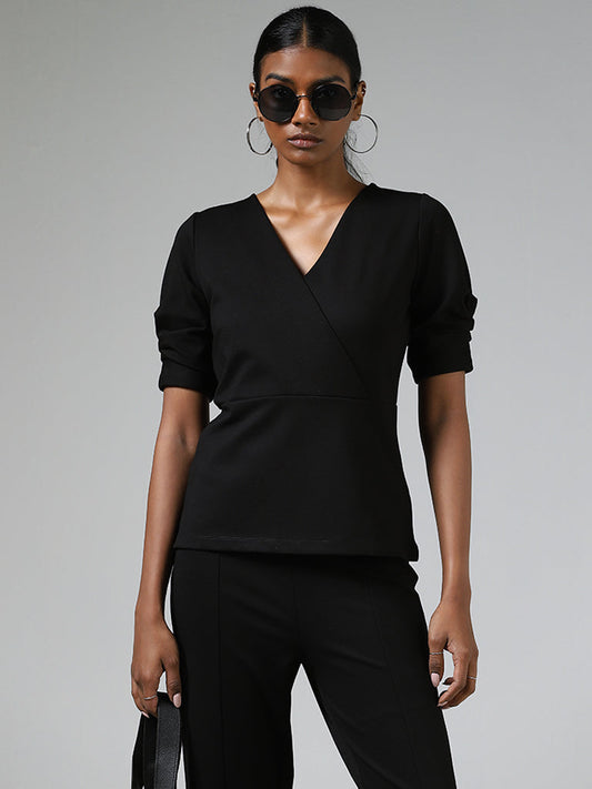 Wardrobe Black Solid V-Neck Top