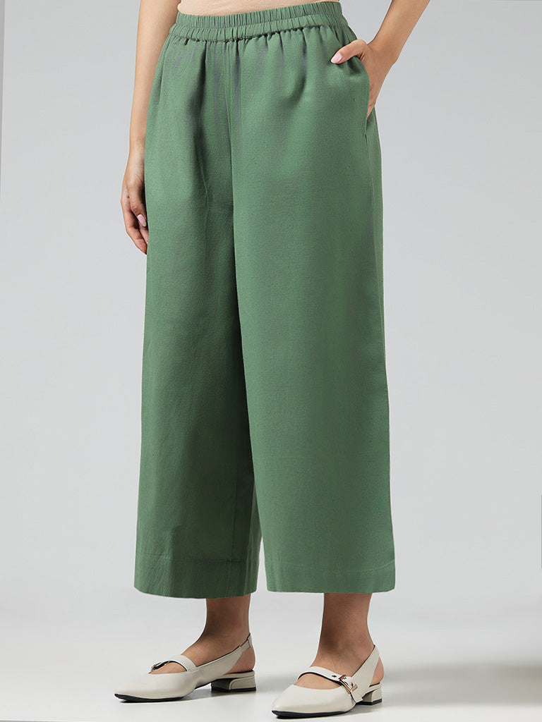 Utsa Solid Green Cotton Blend Mid Rise Palazzos