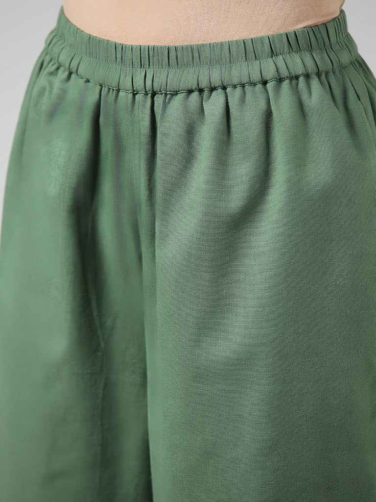 Utsa Solid Green Cotton Blend Mid Rise Palazzos