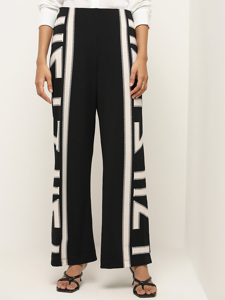 Wardrobe Black Printed Trousers