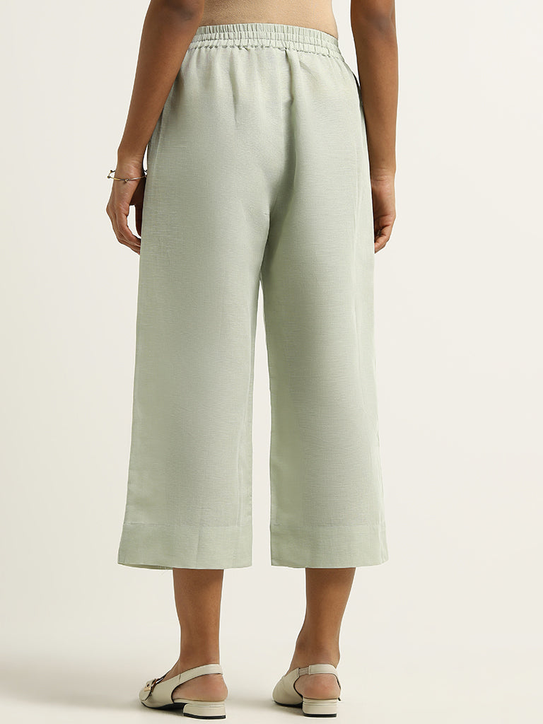 Zuba Green Mid-Rise Blended Linen Palazzos