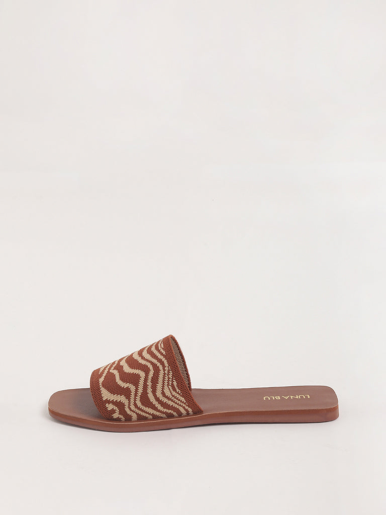 LUNA BLU Tan Zebra-Striped Slides