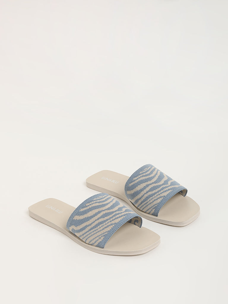 LUNA BLU Light Blue Zebra-Striped Slides