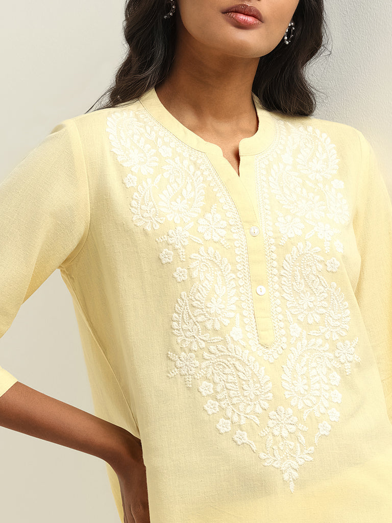 Utsa Yellow Embroidered Kurti