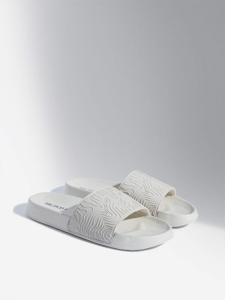 SOLEPLAY Off-White Wave-Textured Slides