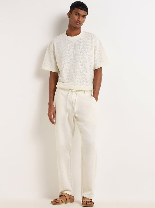 ETA Off-White Solid Cotton Blend Mid Rise Relaxed Fit Pants