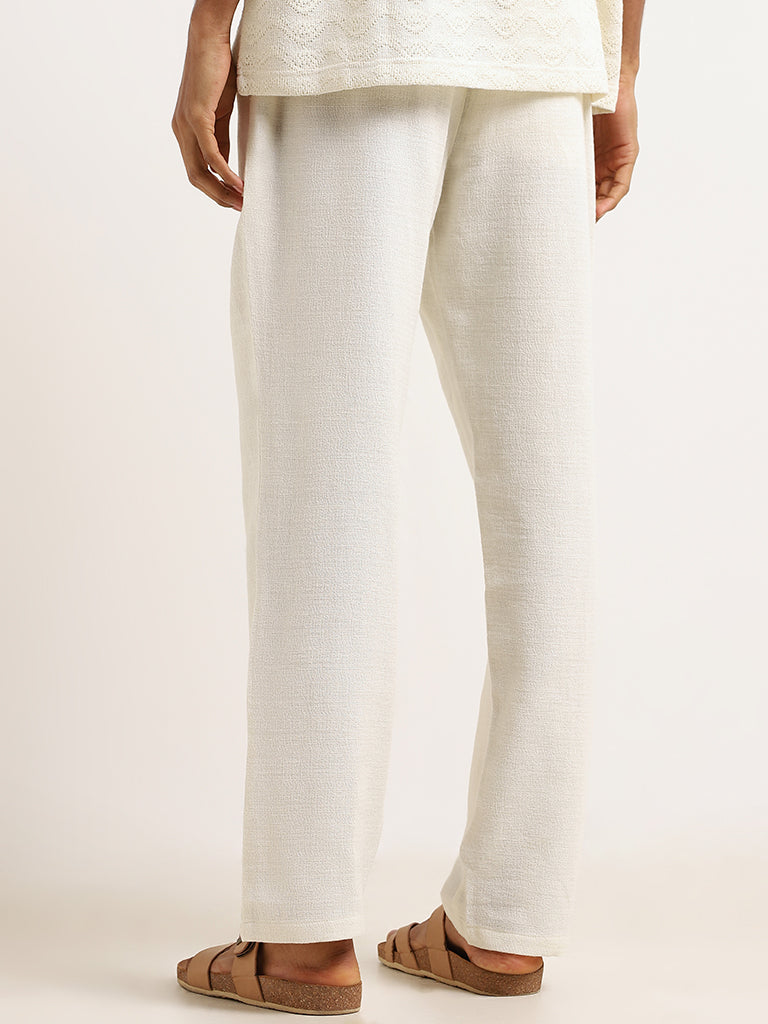 ETA Off-White Solid Cotton Blend Mid Rise Relaxed Fit Pants