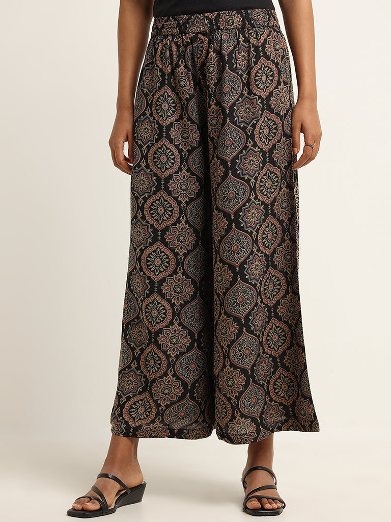 Utsa Black Printed Mid Rise Palazzos