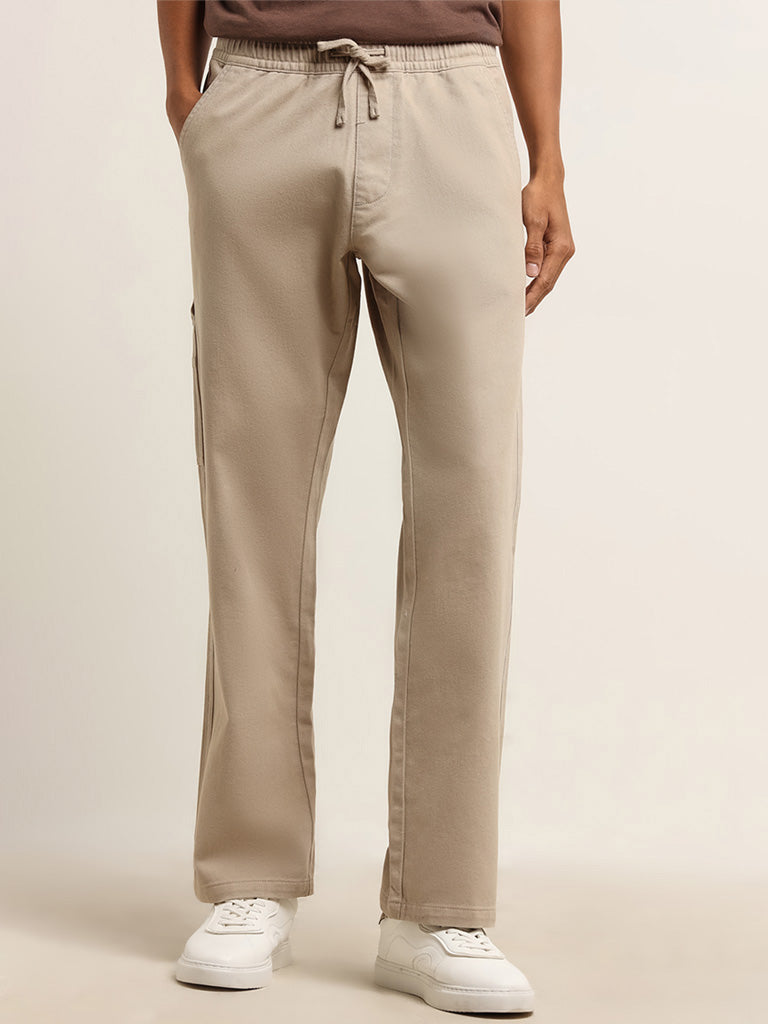 Nuon Beige Relaxed Fit Solid Cotton Mid Rise Pants