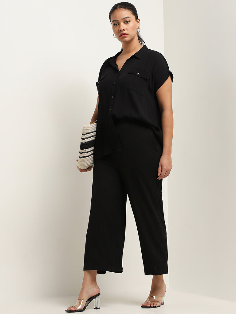 Gia Black Ribbed Mid Rise Flared Pants