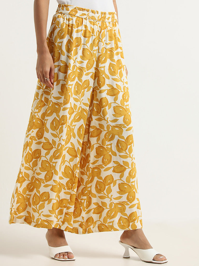 Utsa Yellow Floral Printed Mid-Rise Palazzos